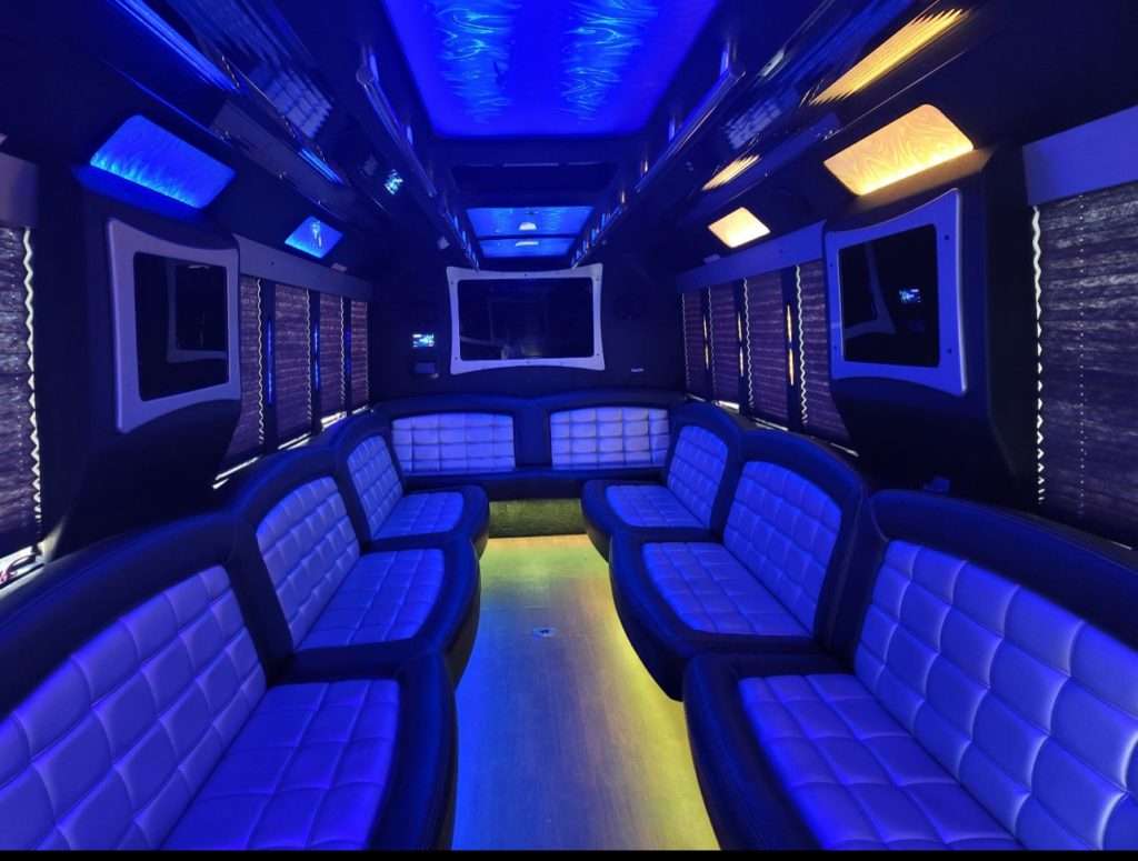 30-passenger party bus interior with party lighting in Pueblo